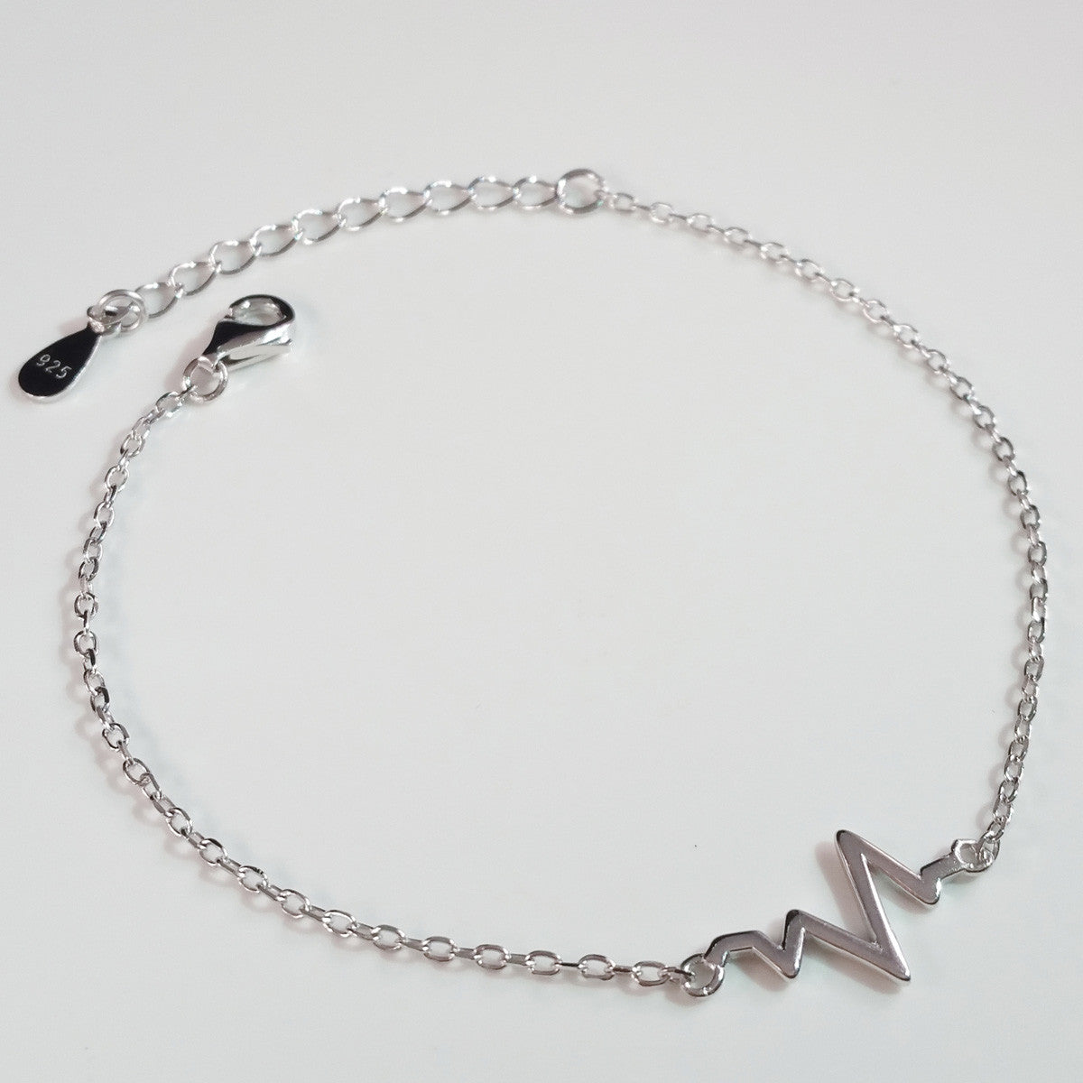 925 STERLING SILVER BRACELET WITH EKG HEARTBEAT CHARM.