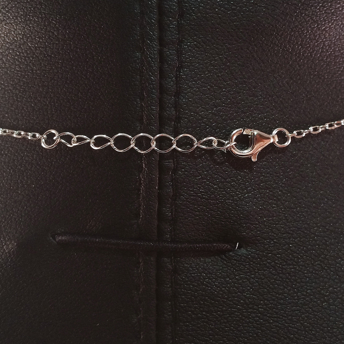 925 STERLING SILVER NECKLACE WITH DOVE PENDANT SET IN SPARKLING CRYSTALS.