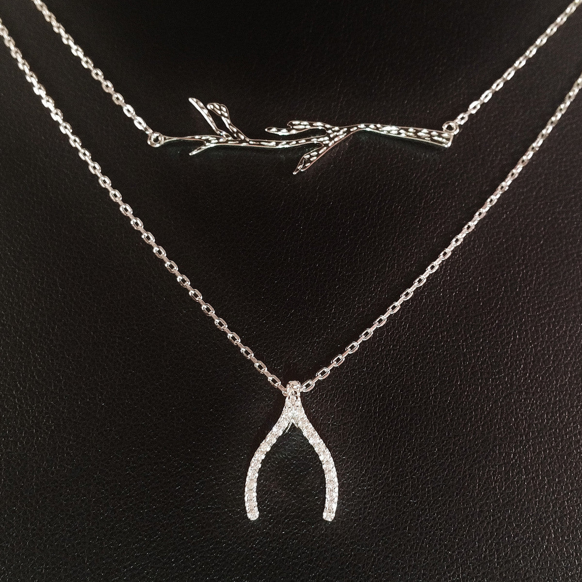 925 STERLING SILVER DOUBLE LAYER NECKLACE WITH CRYSTAL WISHBONE AND TREE BRANCH PENDANT.