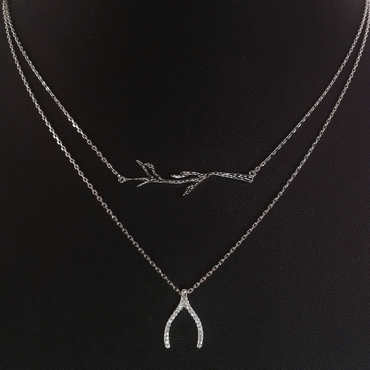 925 STERLING SILVER DOUBLE LAYER NECKLACE WITH CRYSTAL WISHBONE AND TREE BRANCH PENDANT.