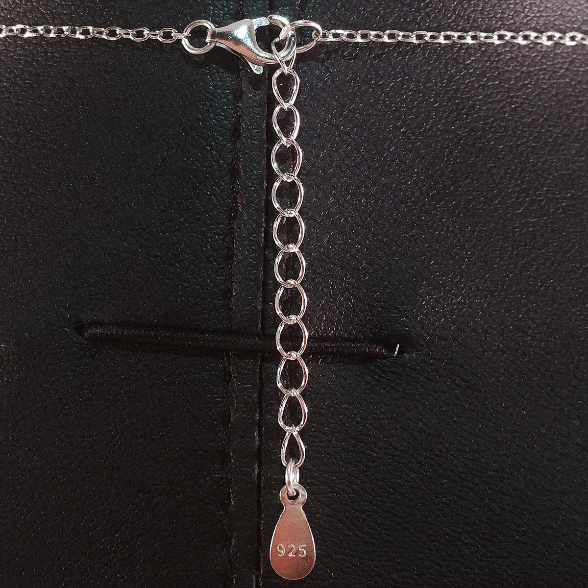 925 STERLING SILVER NECKLACE WITH TURKISH EVIL EYE CHARM AND HAMSA HAND PENDANT SET IN SPARKLING CRYSTALS.