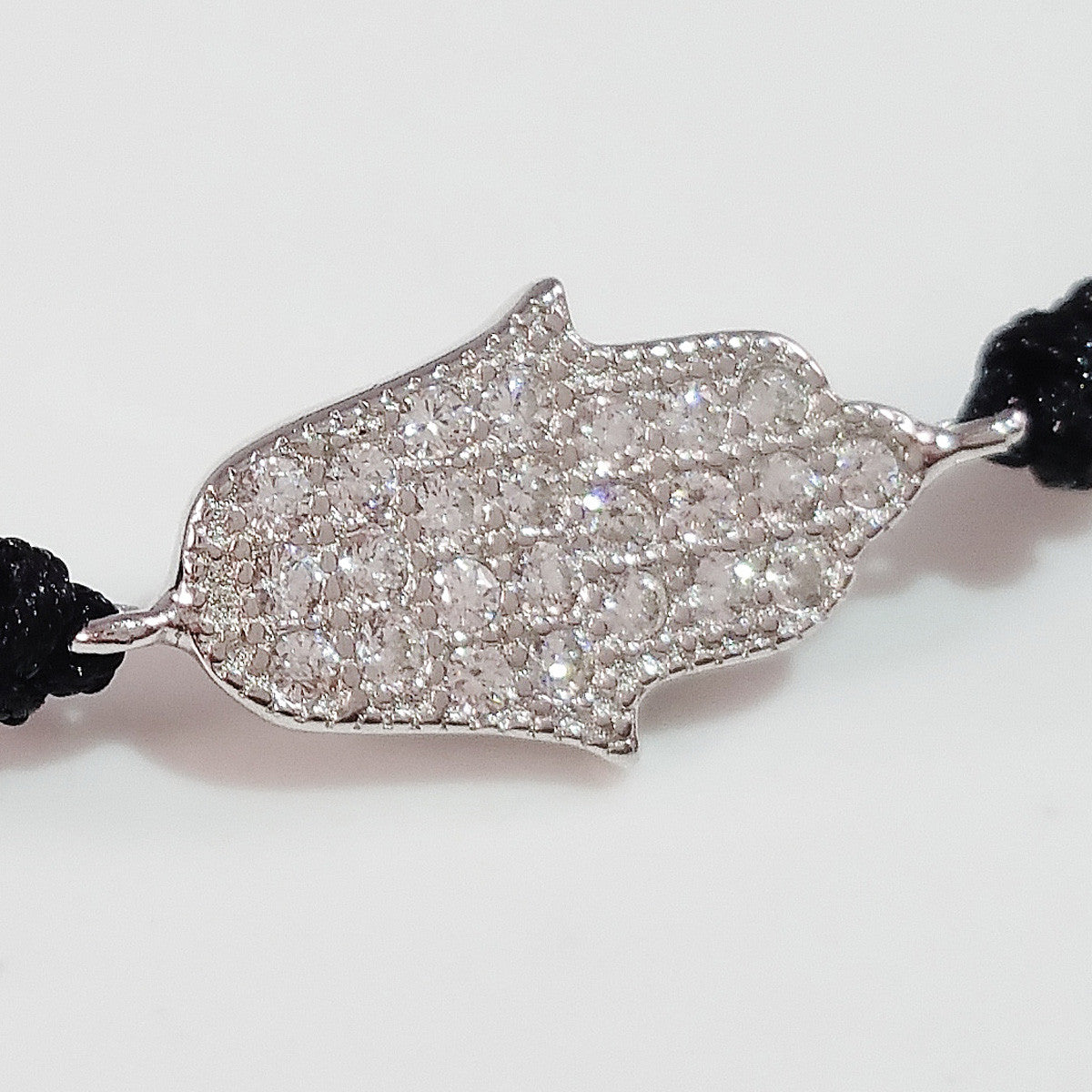 925 STERLING SILVER CZ CRYSTAL HAMSA HAND ON THREADED BRAIDED BRACELET.