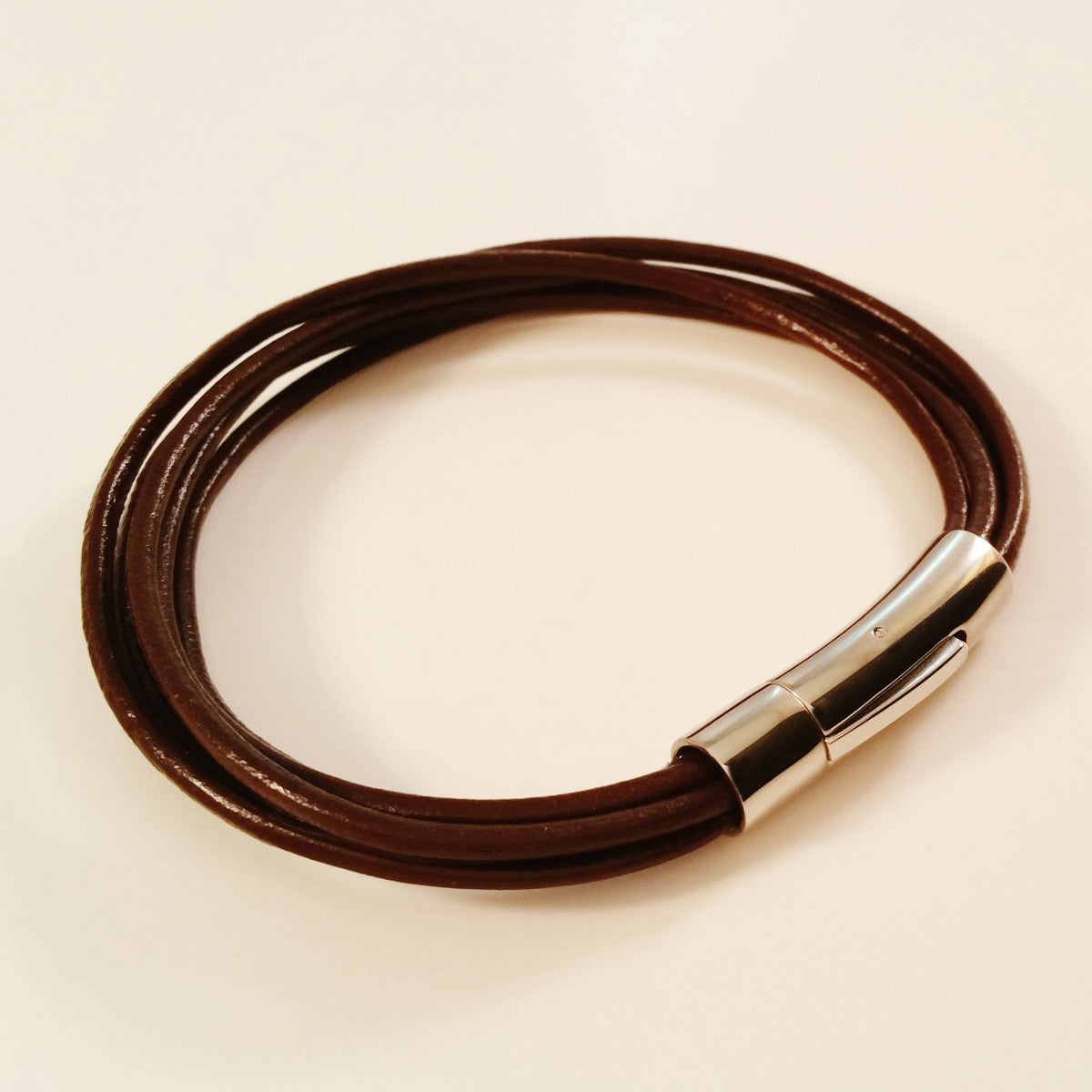 MEN'S MULTI LAYER COW HIDE LEATHER BRACELET WITH STAINLESS STEEL CLASP.