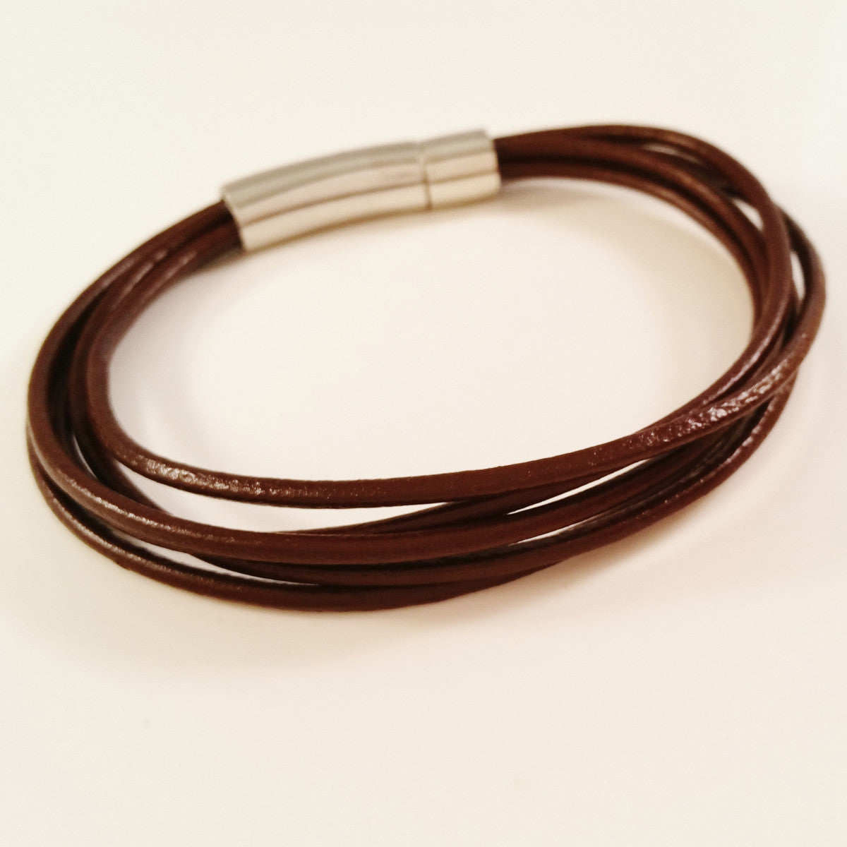 MEN'S MULTI LAYER COW HIDE LEATHER BRACELET WITH STAINLESS STEEL CLASP.