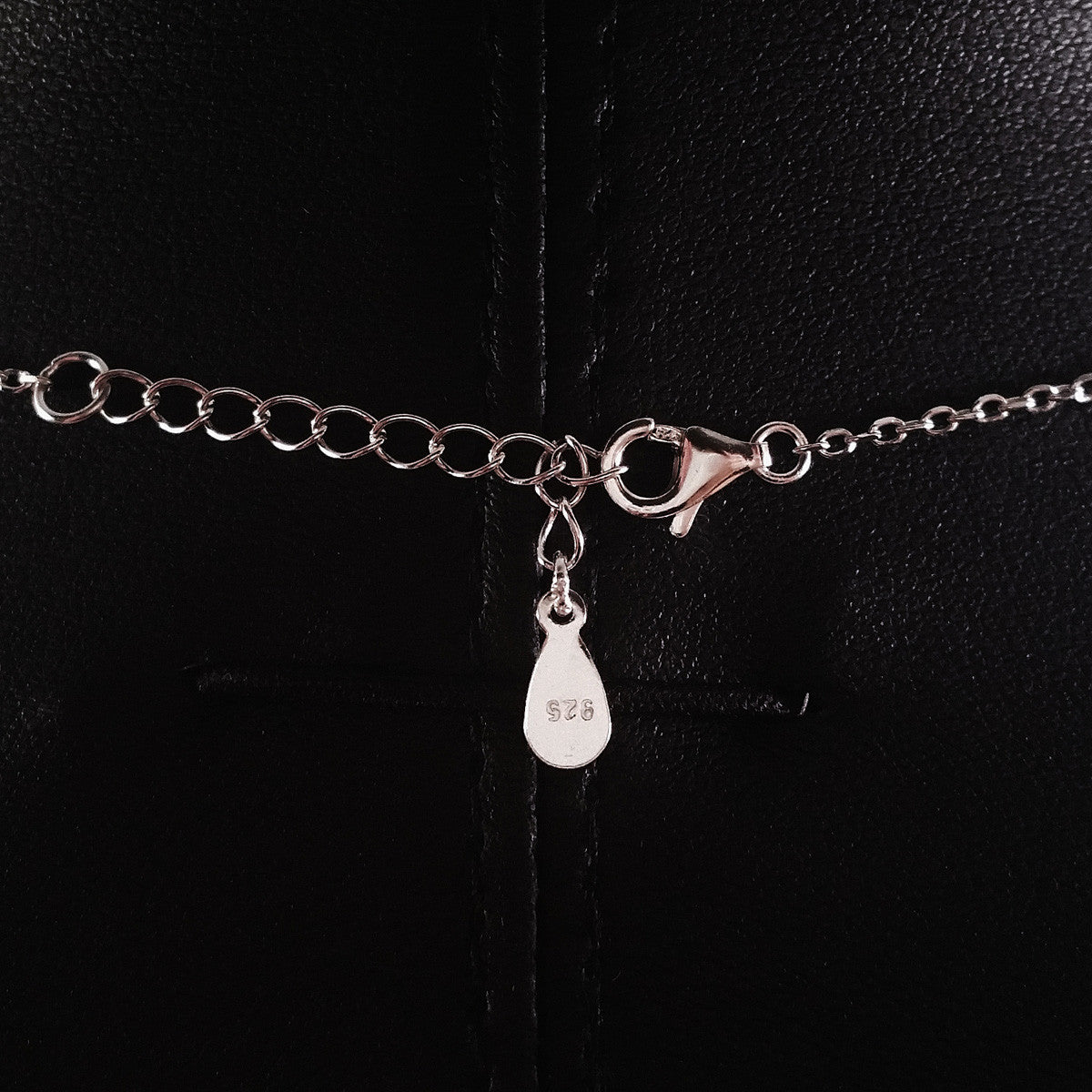 925 STERLING SILVER NECKLACE WITH ETERNITY PENDANT SET IN SPARKLING CRYSTALS.