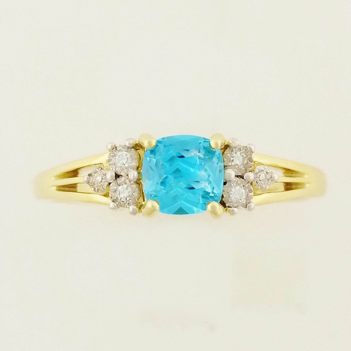 9K SOLID YELLOW GOLD 0.60CT NATURAL BLUE TOPAZ RING WITH 6 DIAMONDS.