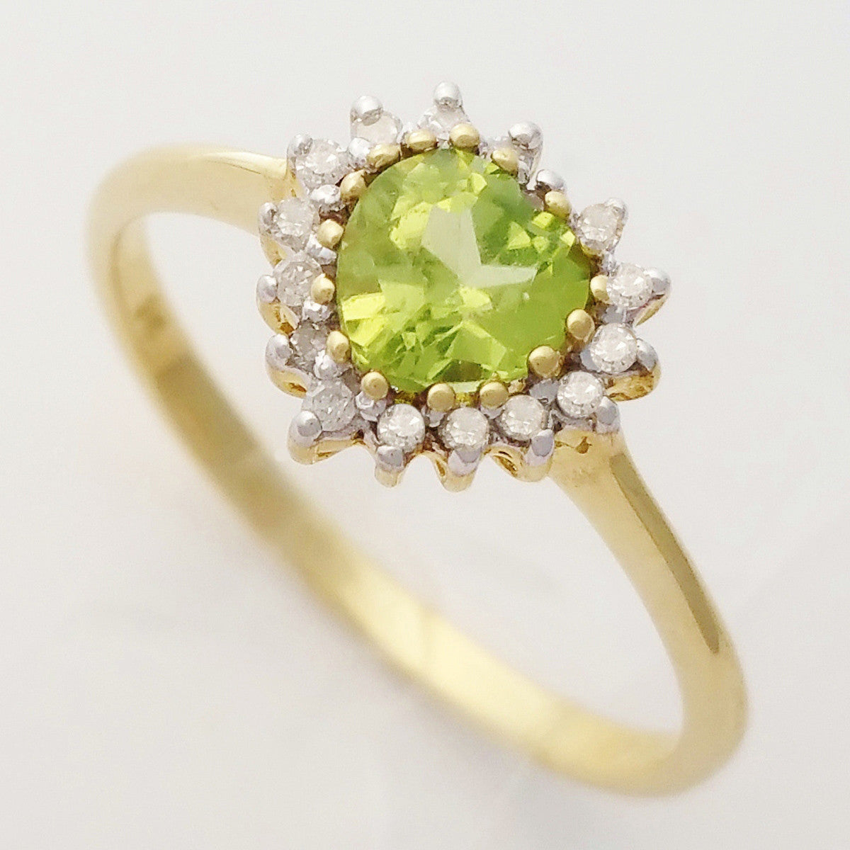 HANDMADE 9K SOLID YELLOW GOLD 0.55CT HEART CUT PERIDOT AND 16 DIAMOND RING.