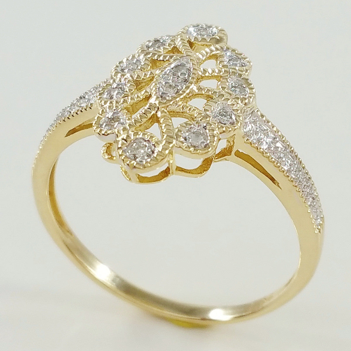 9K SOLID GOLD ART DECO INSPIRED NAVETTE RING WITH 12 DIAMONDS.
