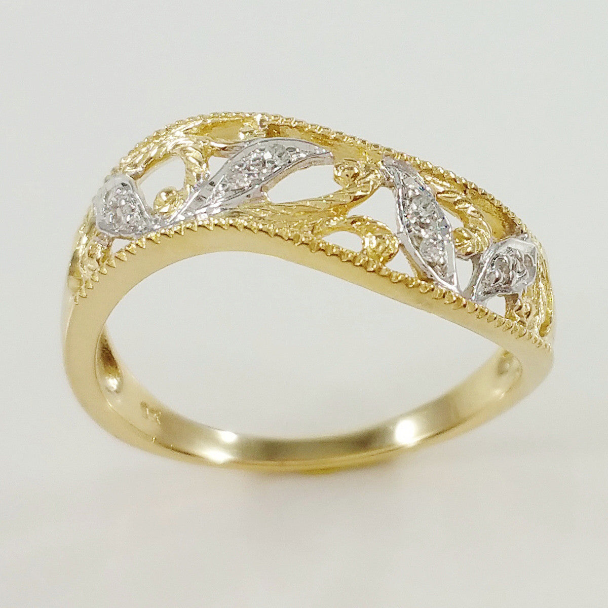 9K SOLID GOLD FILIGREE VINTAGE STYLE RING WITH 8 DIAMONDS.