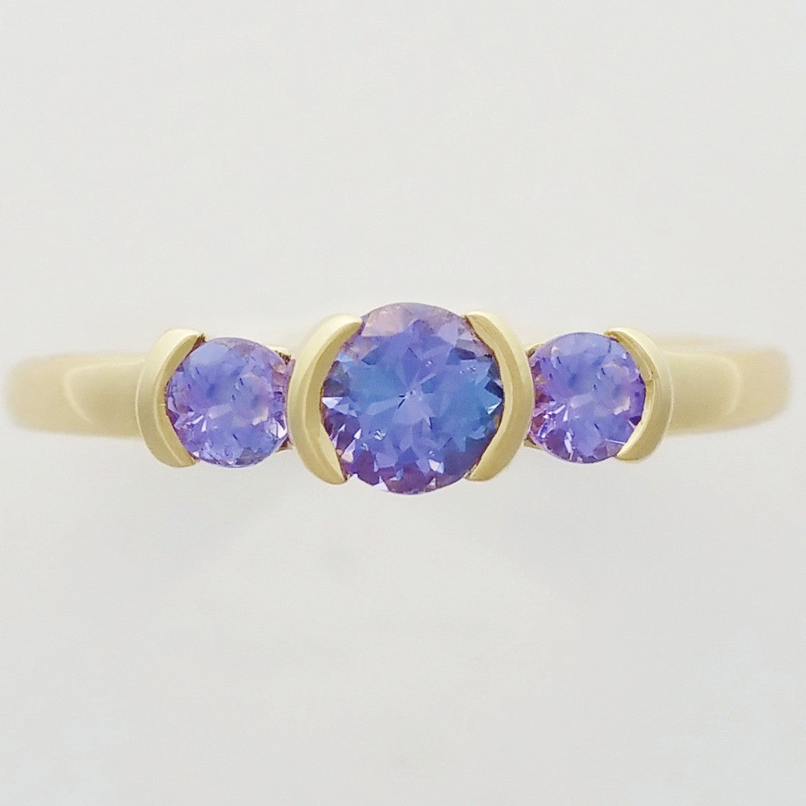 9K SOLID YELLOW GOLD 0.55CT NATURAL TANZANITE 3 STONE RING.