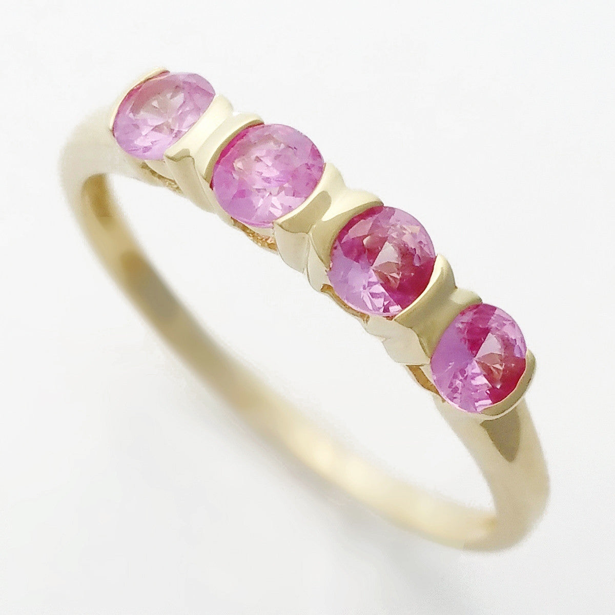 9K SOLID YELLOW GOLD 0.50CT NATURAL PINK SAPPHIRE 4 STONE RING.