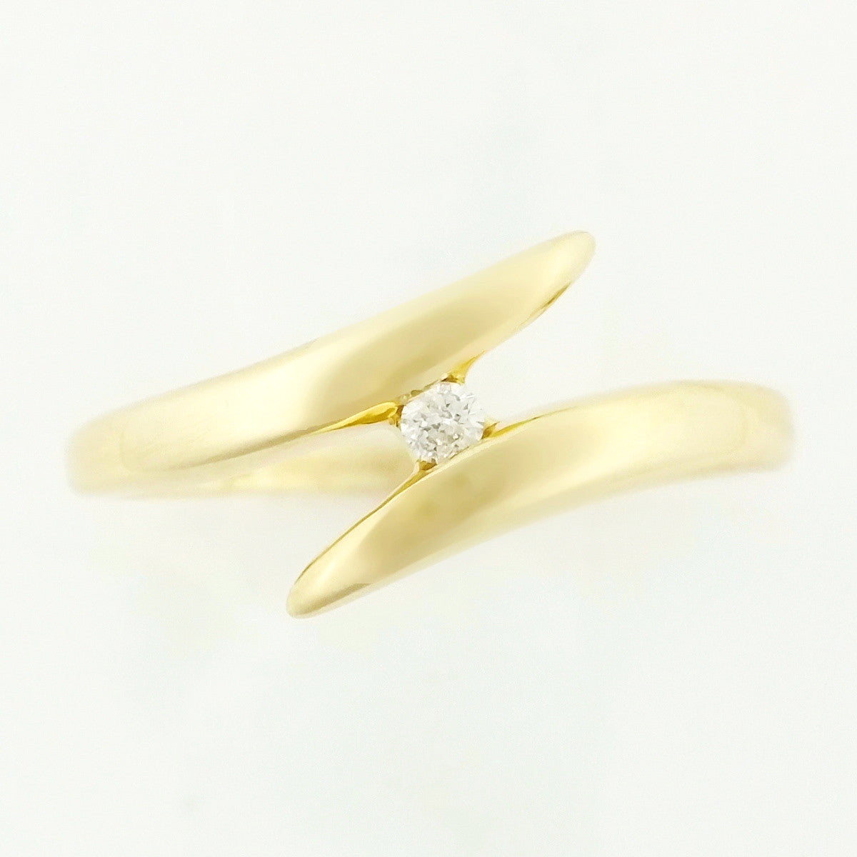 9K SOLID 0.03CT BYPASS DESIGN DIAMOND SOLITAIRE RING.