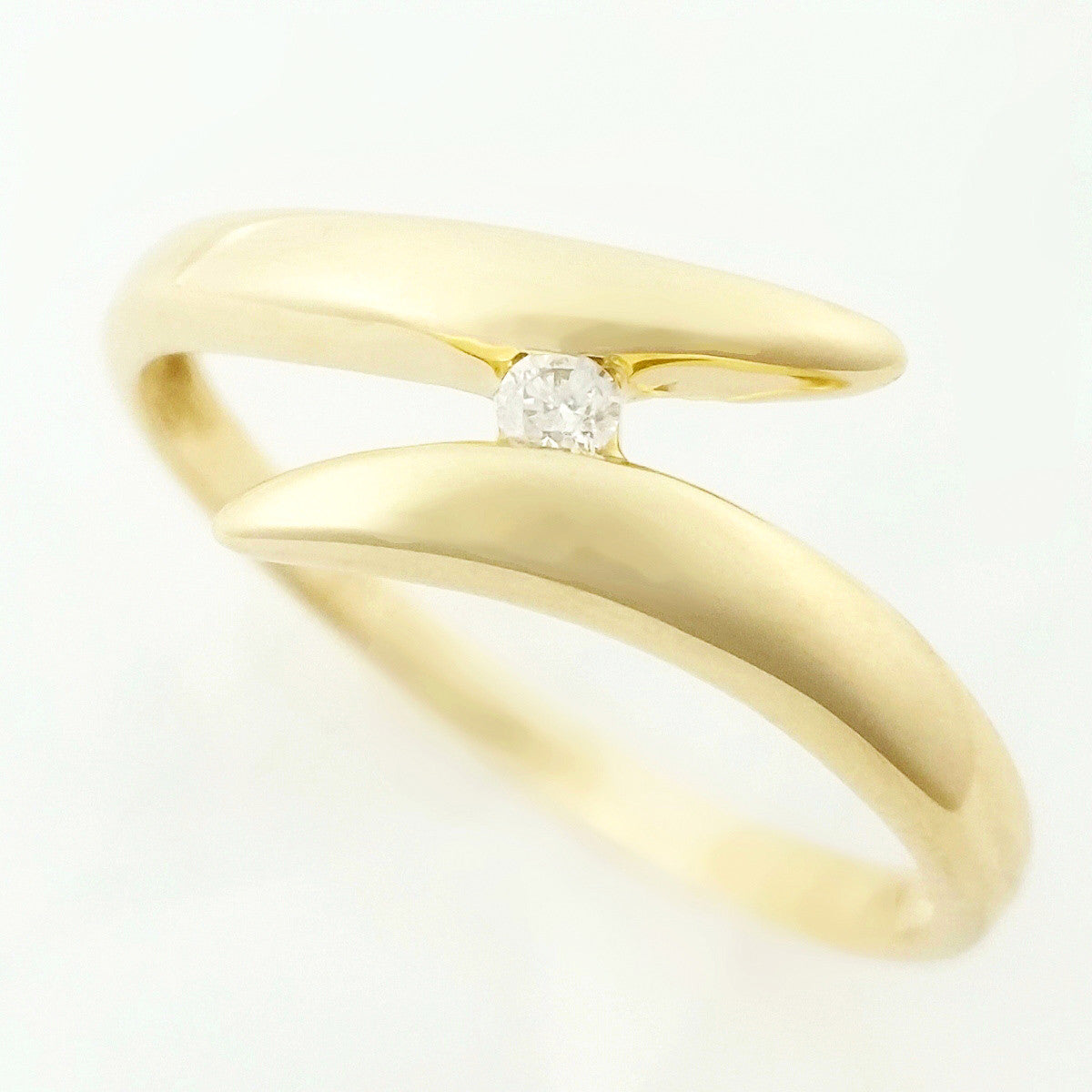 9K SOLID 0.03CT BYPASS DESIGN DIAMOND SOLITAIRE RING.