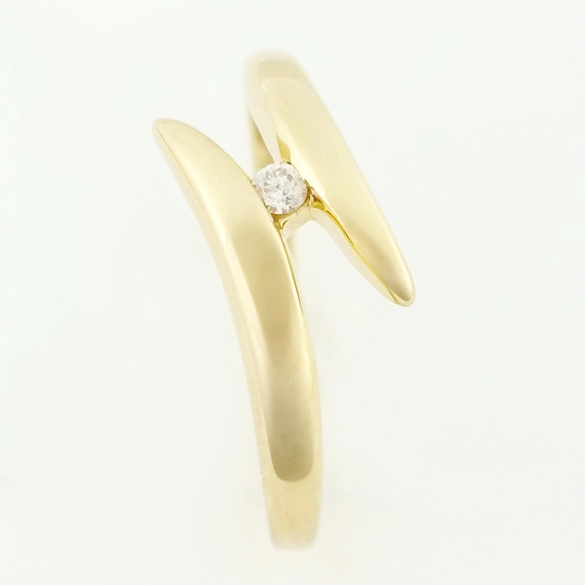 9K SOLID 0.03CT BYPASS DESIGN DIAMOND SOLITAIRE RING.