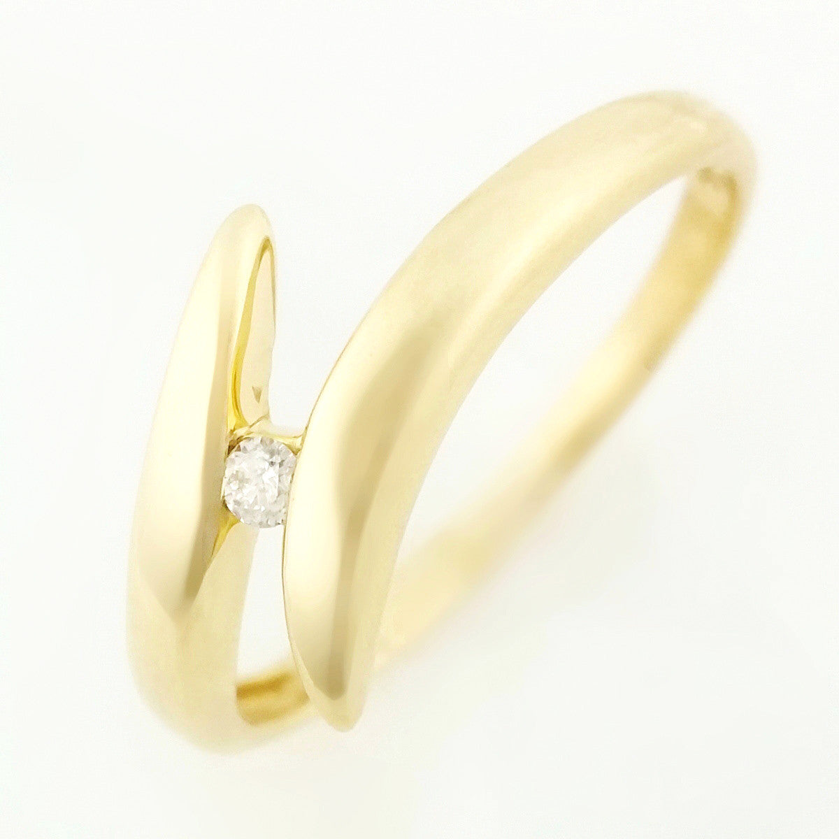 9K SOLID 0.03CT BYPASS DESIGN DIAMOND SOLITAIRE RING.