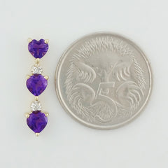 9K SOLID GOLD 0.70CT NATURAL AMETHYST PENDANT WITH 2 DIAMONDS.