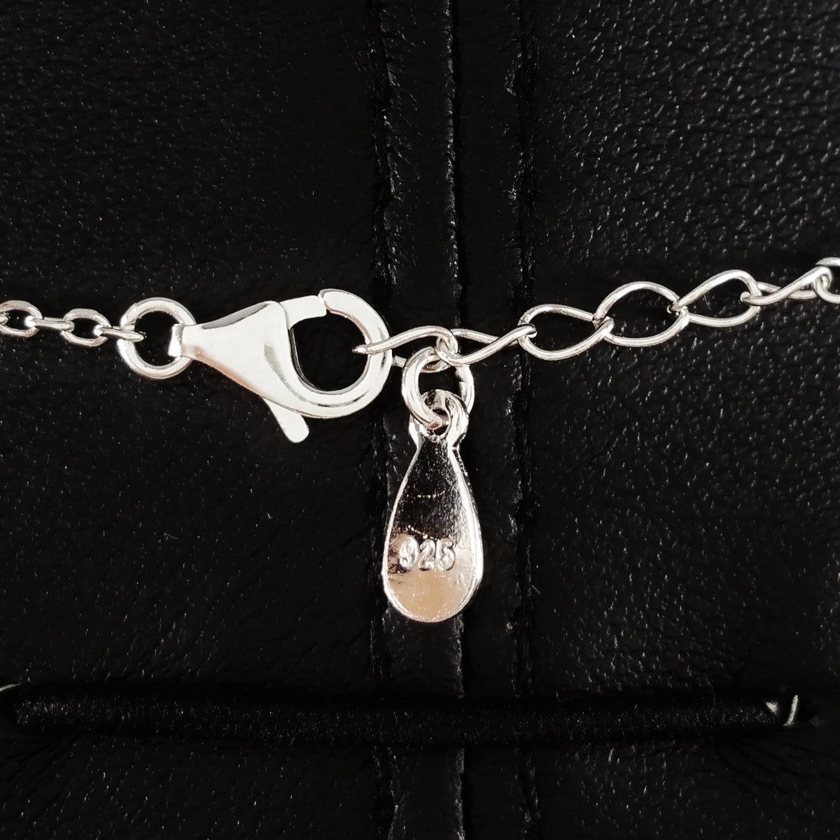 925 STERLING SILVER NECKLACE WITH OM NAMASTE PENDANT SET IN SPARKLING CRYSTALS.