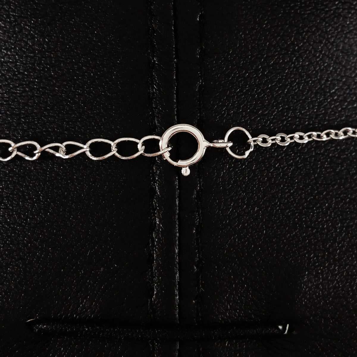 925 STERLING SILVER NECKLACE WITH ROUND EVIL EYE PENDANT SET IN SPARKLING CRYSTALS.