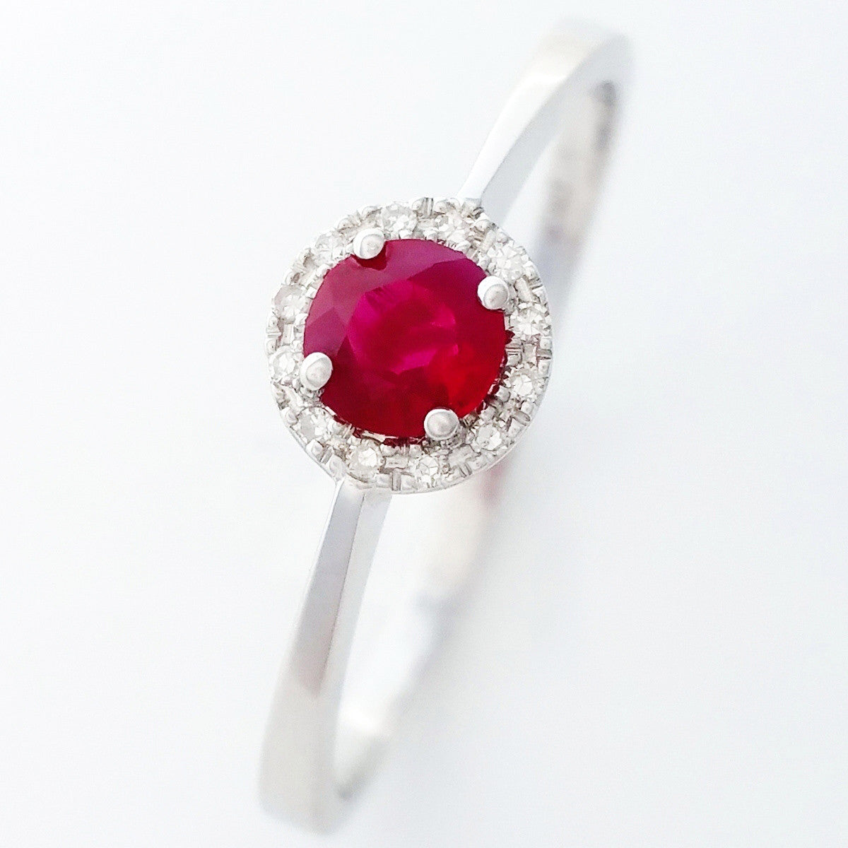 9K SOLID WHITE GOLD 0.30CT NATURAL RUBY HALO RING WITH 12 DIAMONDS.