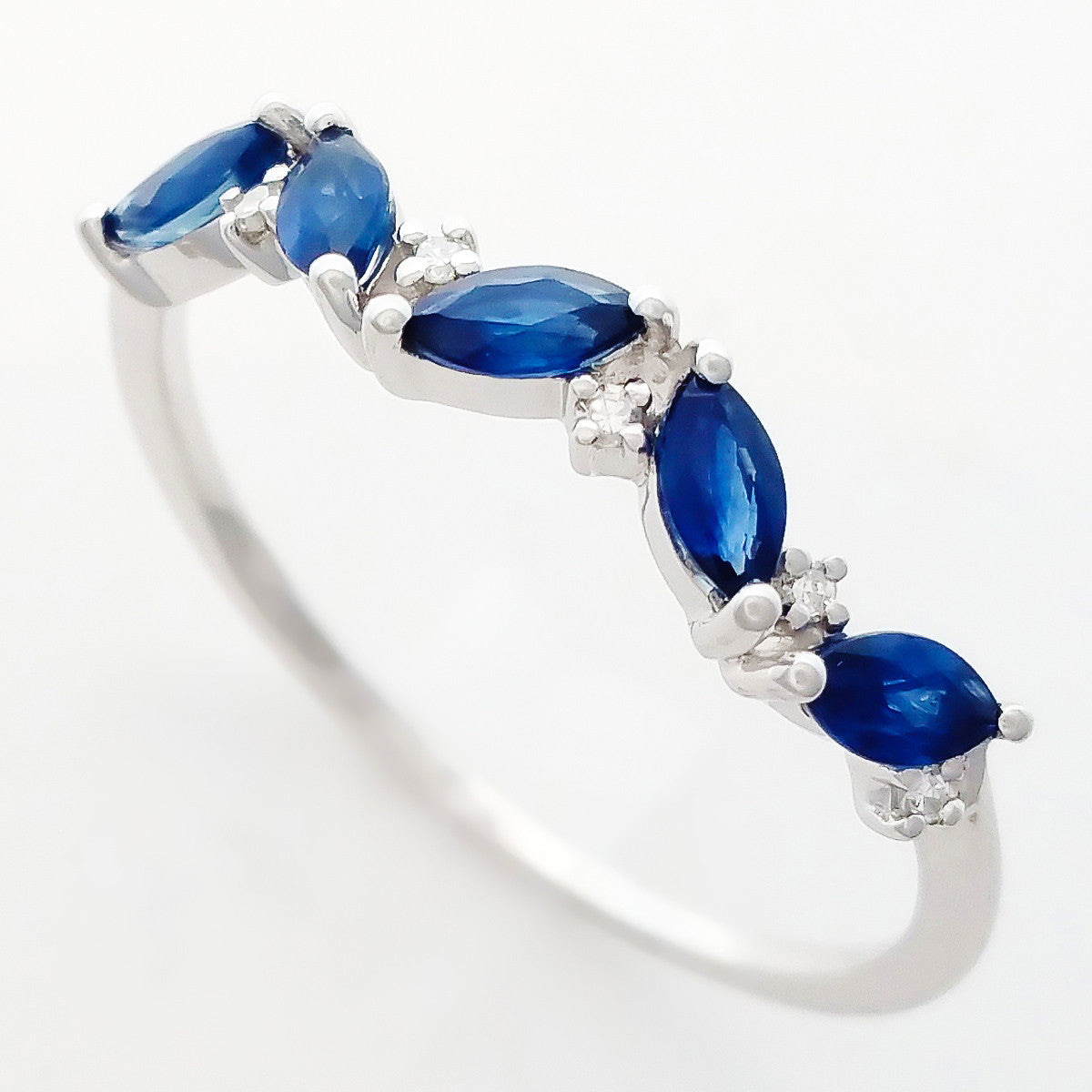 9K SOLID WHITE GOLD 0.60CT NATURAL MARQUISE BLUE SAPPHIRE RING WITH 6 DIAMONDS.