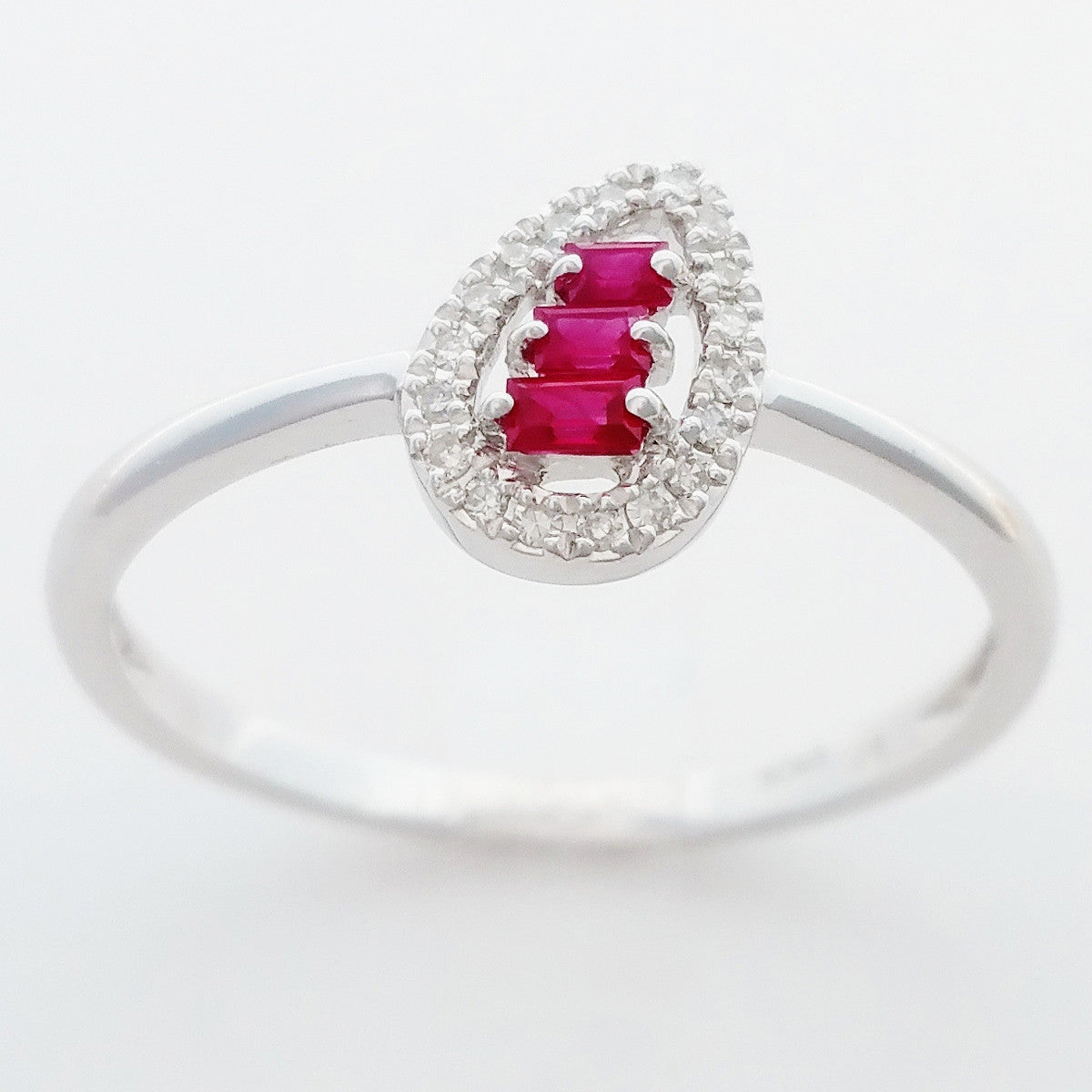 9K SOLID WHITE GOLD NATURAL BAGUETTE RUBY RING WITH 18 DIAMONDS.