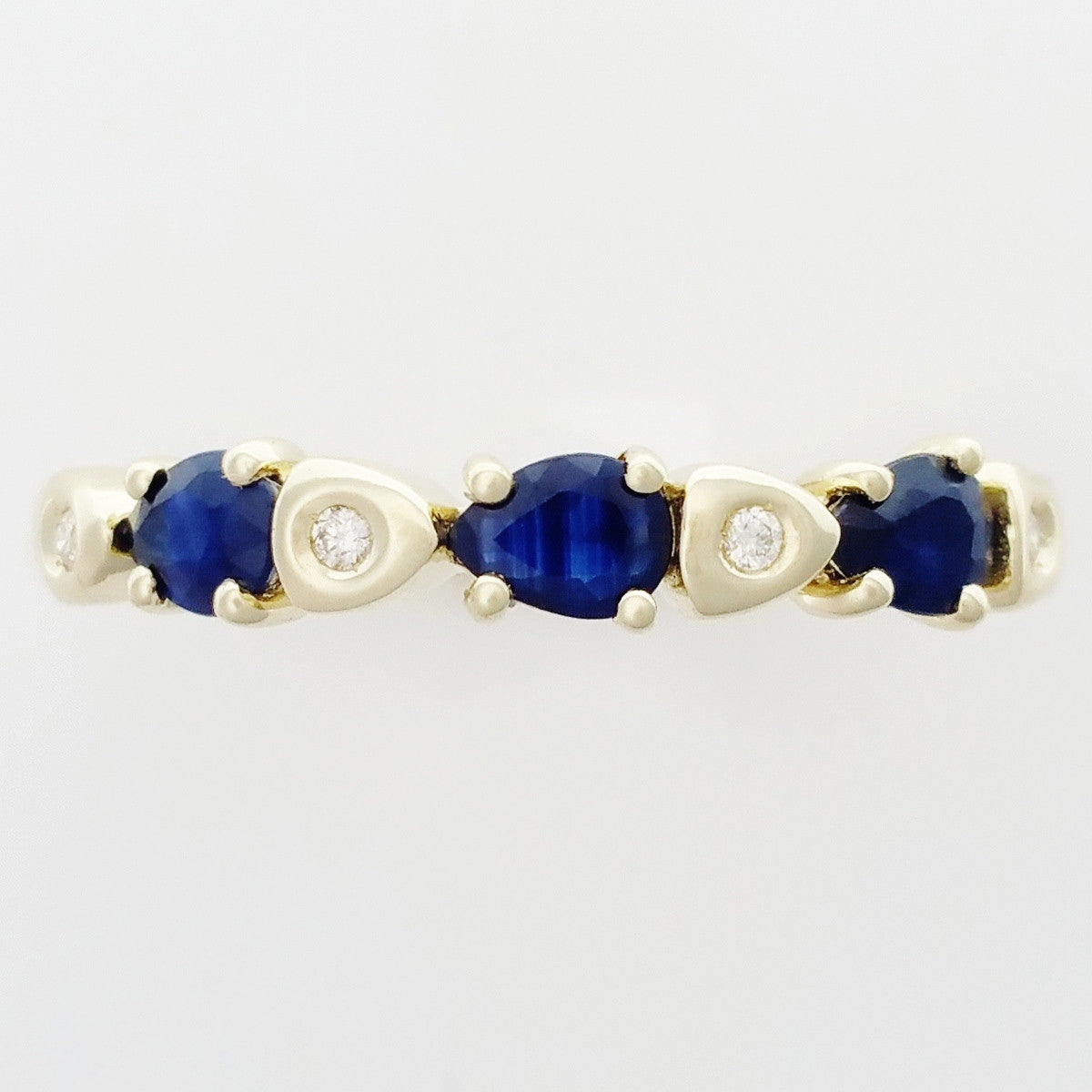 9K SOLID GOLD 0.50CT NATURAL AUSTRALIAN PEAR CUT SAPPHIRE RING WITH 4 DIAMONDS.