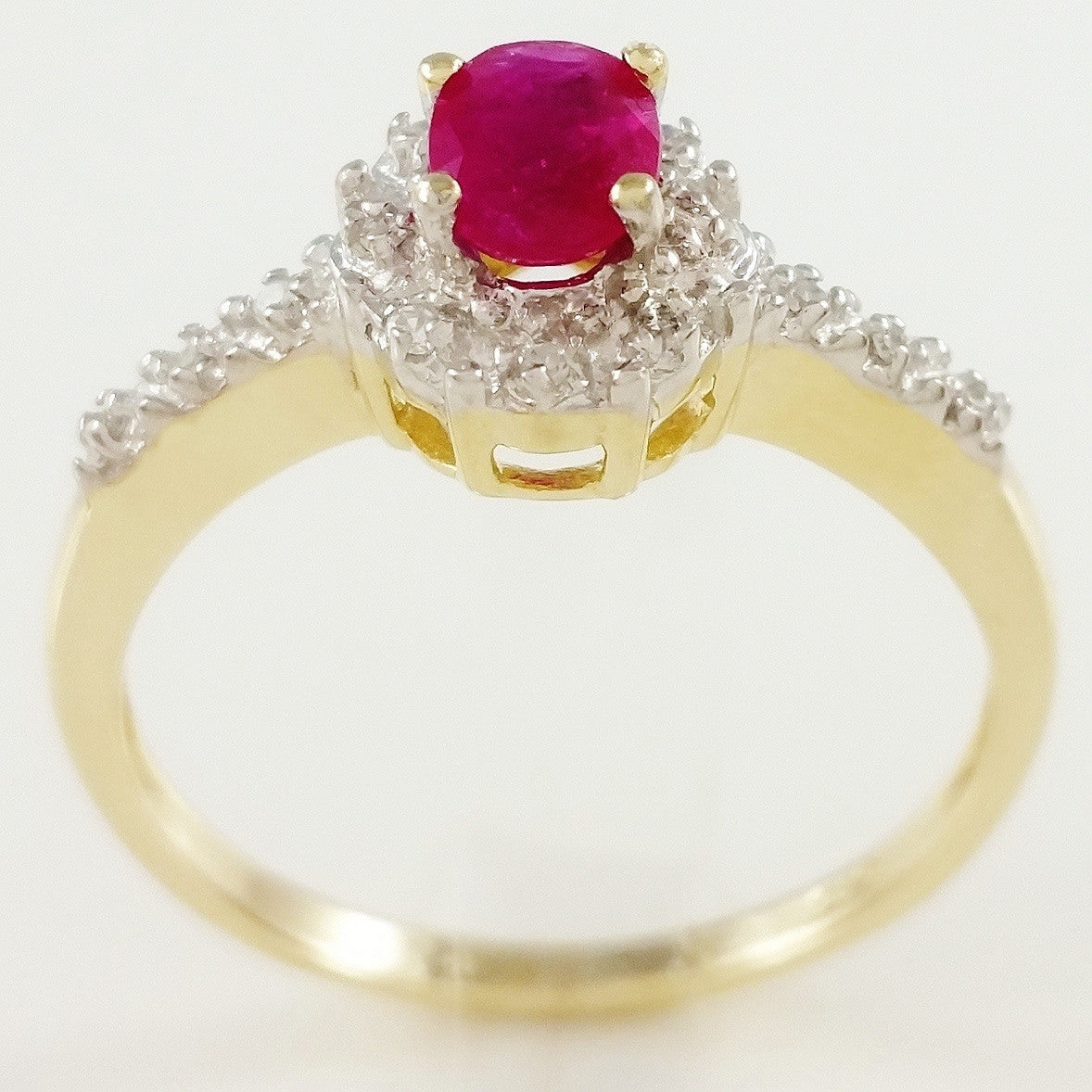 9K SOLID GOLD VINTAGE INSPIRED 0.50CT NATURAL RUBY RING WITH 14 DIAMONDS.