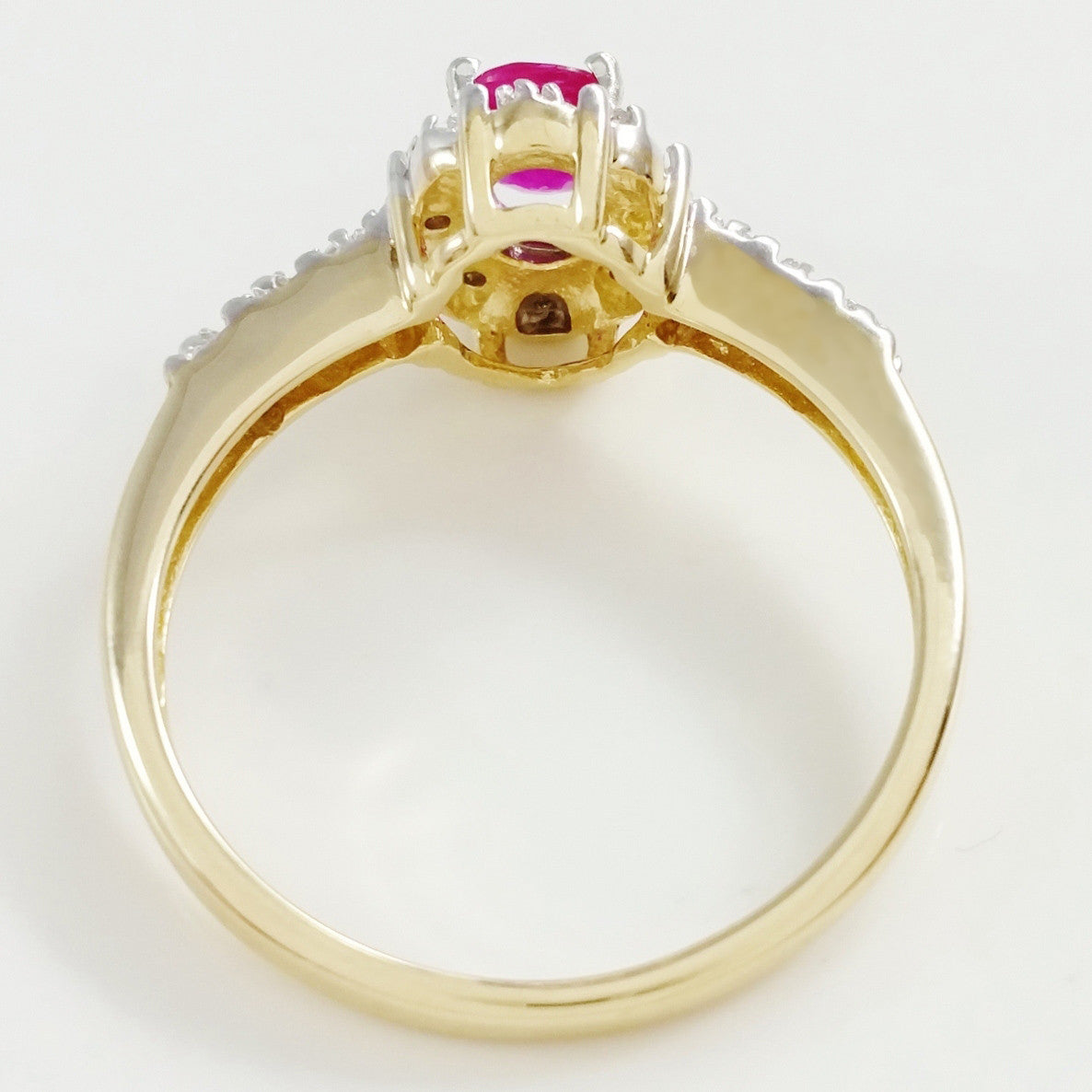9K SOLID GOLD VINTAGE INSPIRED 0.50CT NATURAL RUBY RING WITH 14 DIAMONDS.