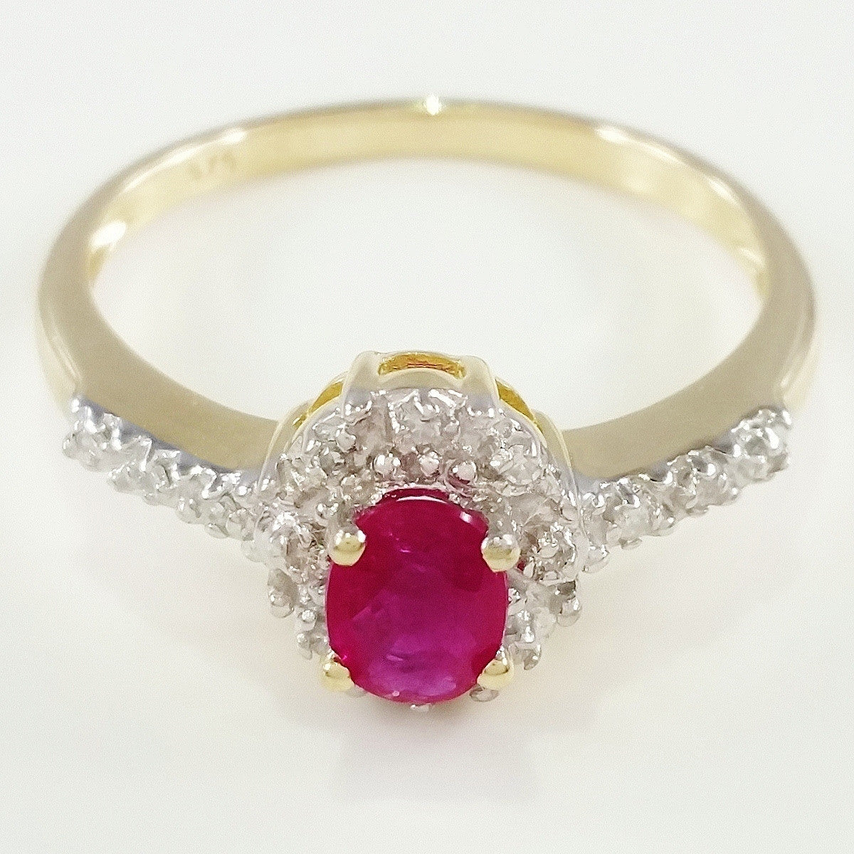 9K SOLID GOLD VINTAGE INSPIRED 0.50CT NATURAL RUBY RING WITH 14 DIAMONDS.