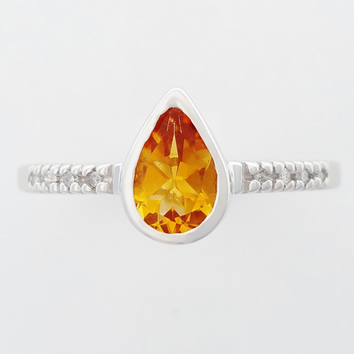 9K SOLID WHITE GOLD 0.70CT NATURAL PEAR CUT CITRINE RING WITH 8 DIAMONDS.