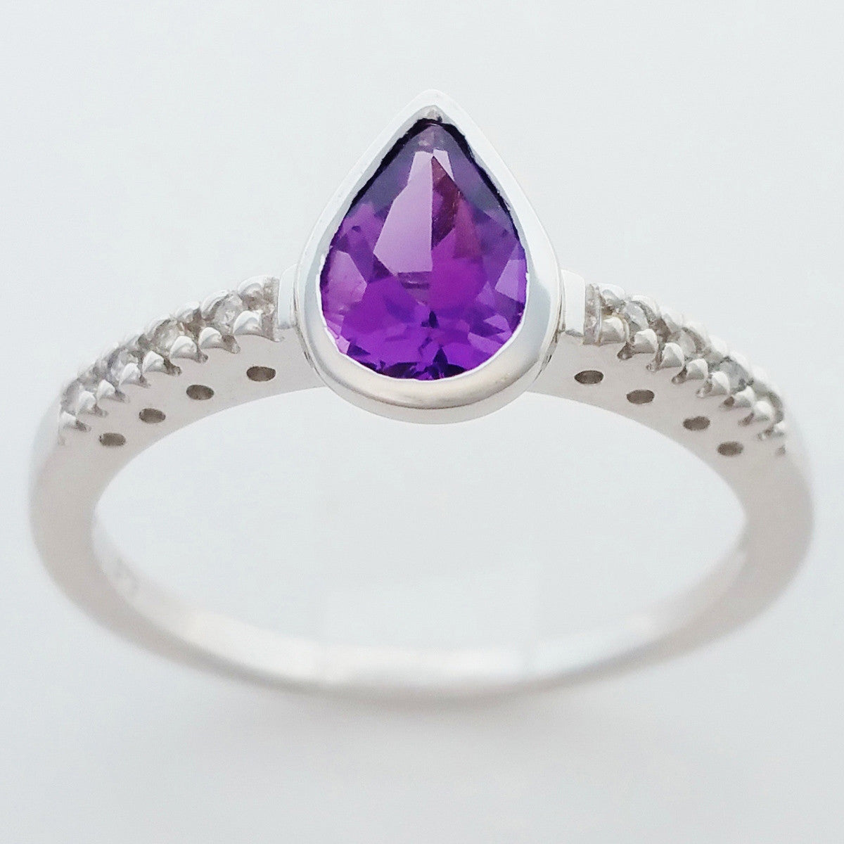 9K SOLID WHITE GOLD 0.70CT NATURAL PEAR CUT AMETHYST RING WITH 8 DIAMONDS.