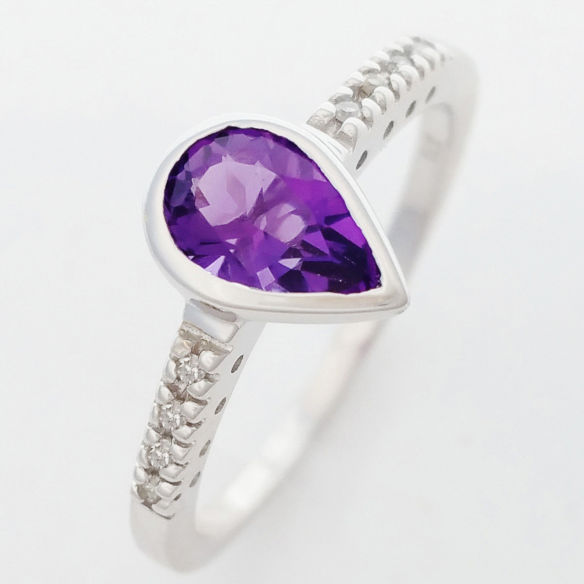 9K SOLID WHITE GOLD 0.70CT NATURAL PEAR CUT AMETHYST RING WITH 8 DIAMONDS.