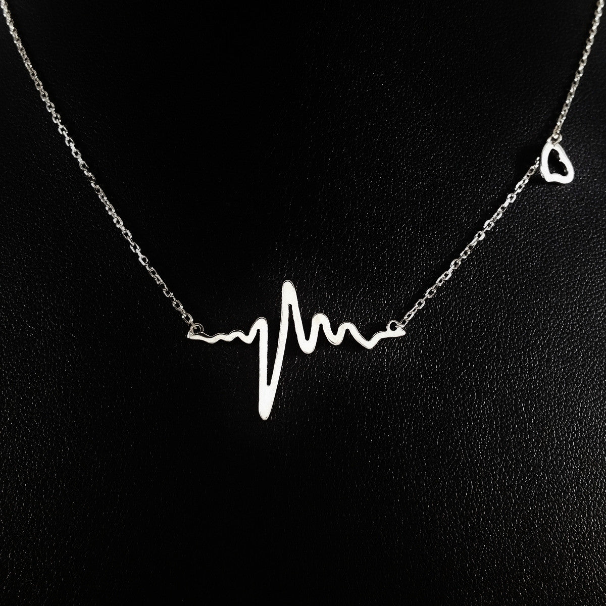 925 STERLING SILVER NECKLACE WITH SOLID SILVER EKG HEARTBEAT CHARM PENDANT.
