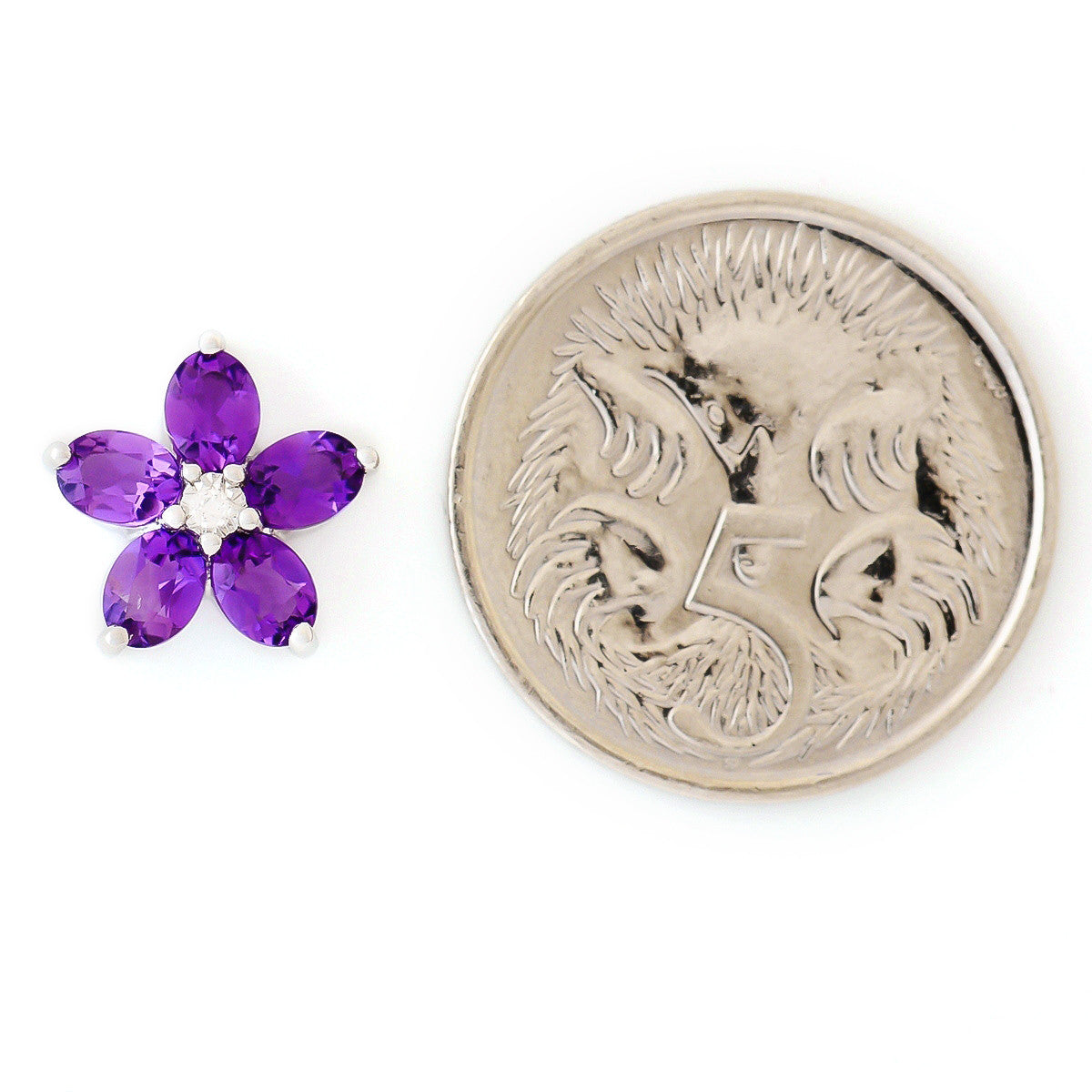 9K SOLID WHITE GOLD 1.30CT AFRICAN AMETHYST EARRINGS WITH CENTRE DIAMONDS.