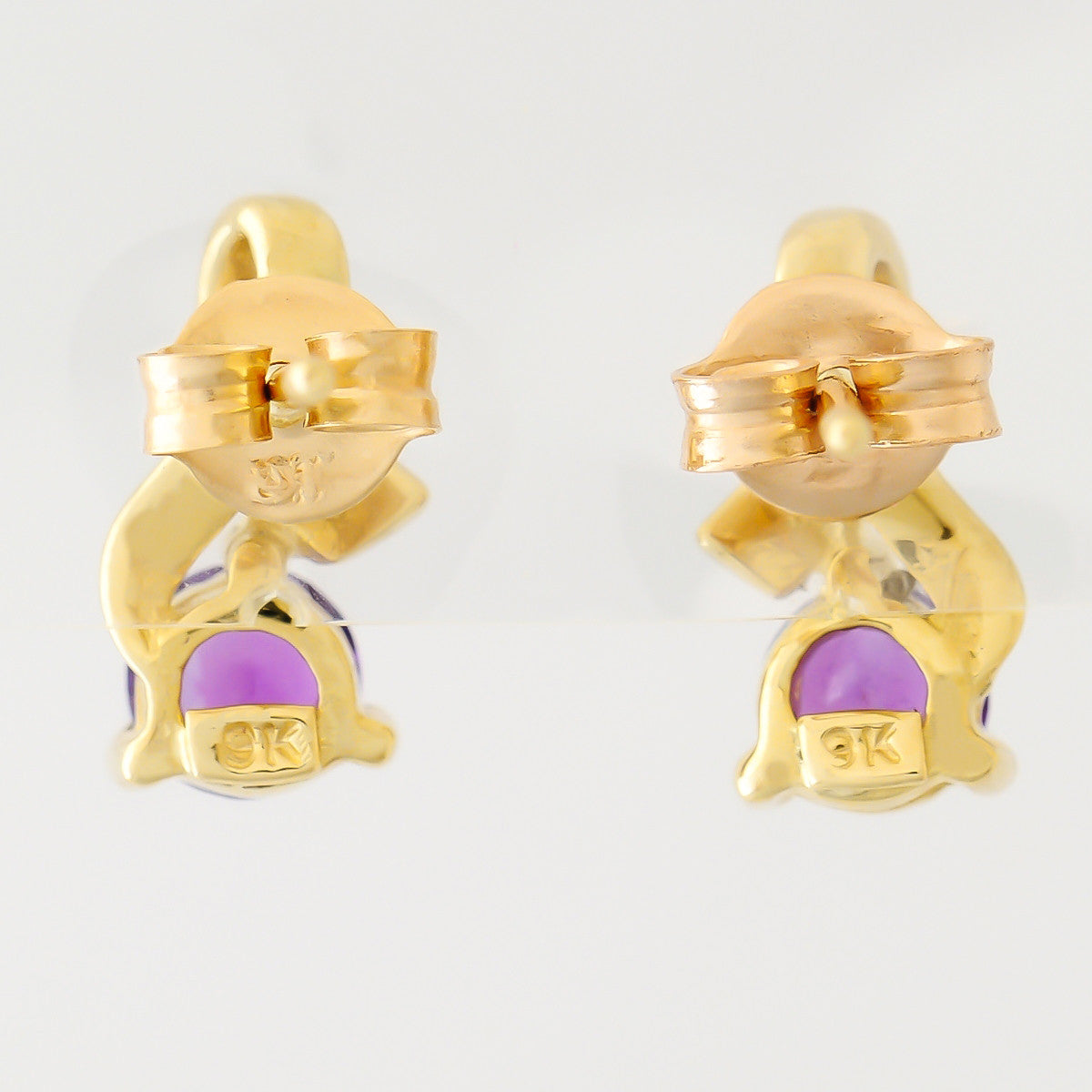 9K SOLID GOLD 0.92CT AMETHYST AND DIAMOND STUD EARRINGS.