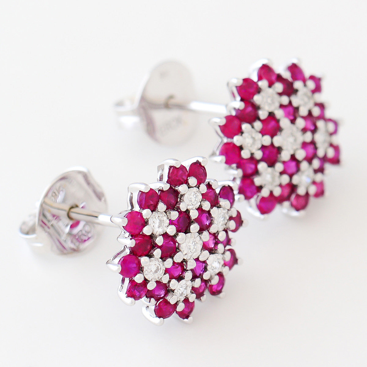 9K SOLID WHITE GOLD 1.20CT NATURAL RUBY CLUSTER EARRINGS WITH 14 DIAMONDS.