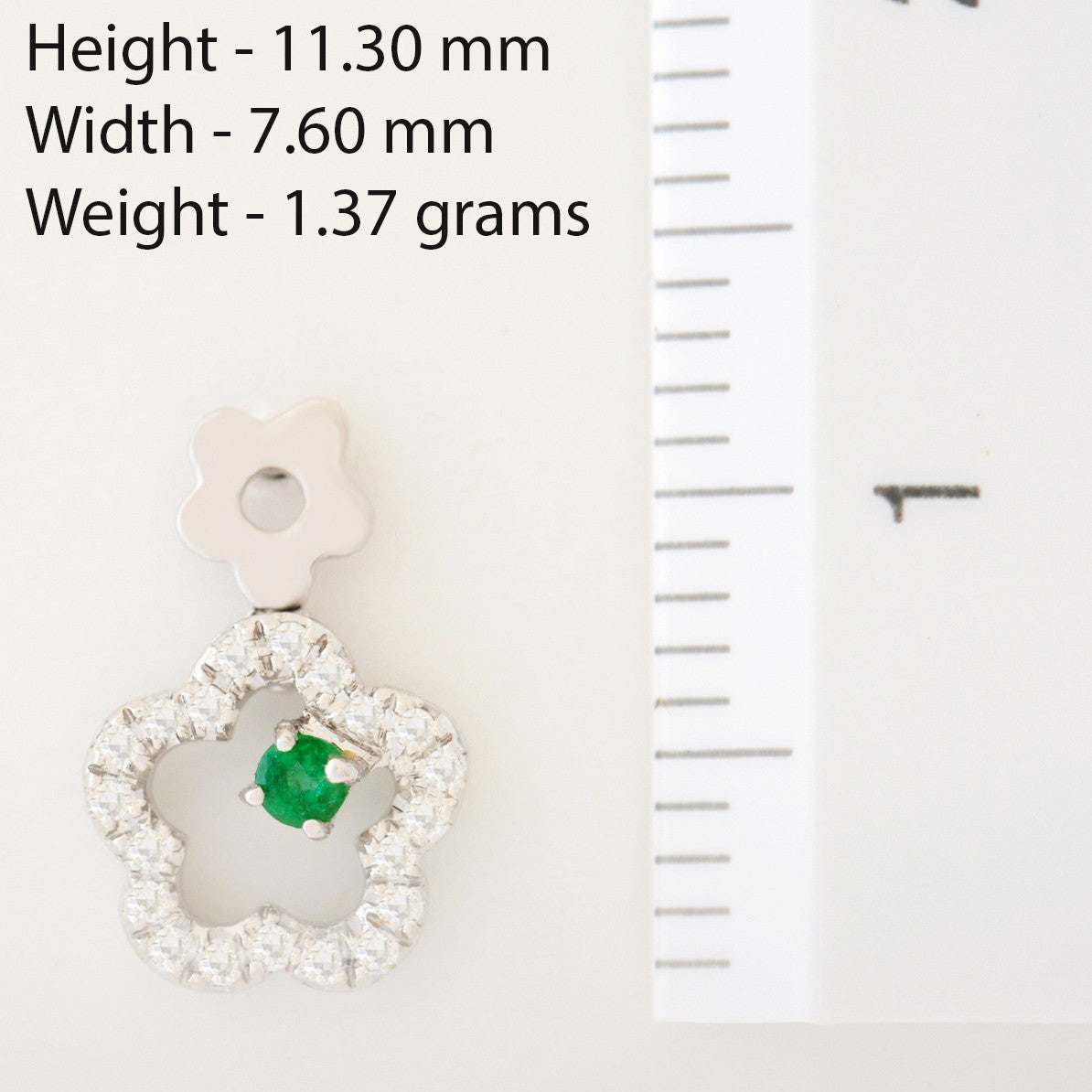9K SOLID WHITE GOLD FLORAL INSPIRED NATURAL EMERALD EARRINGS WITH 40 DIAMONDS.