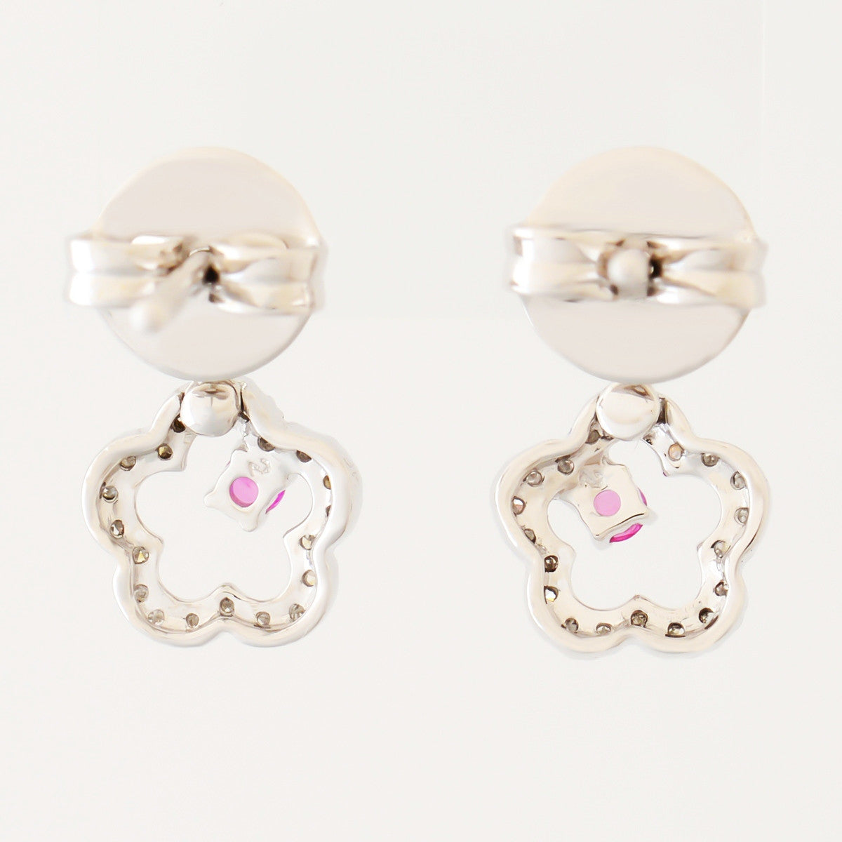 9K SOLID WHITE GOLD FLORAL INSPIRED NATURAL RUBY EARRINGS WITH 40 DIAMONDS.