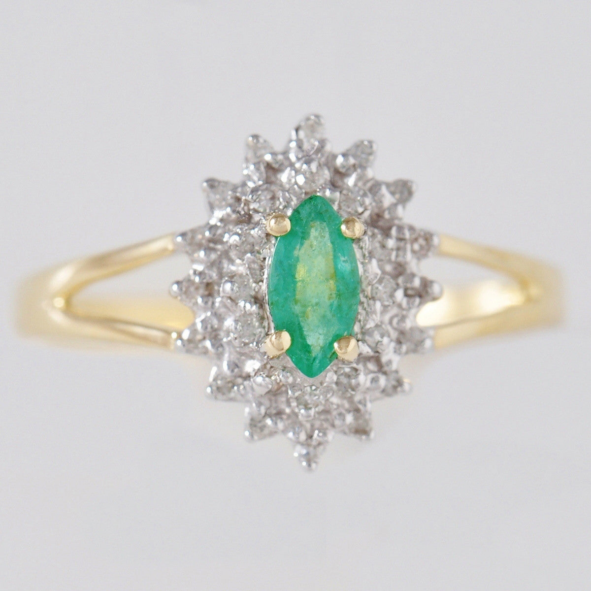 9K SOLID GOLD VINTAGE INSPIRED 0.25CT MARQUISE EMERALD RING WITH 28 DIAMONDS.