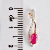 9K SOLID WHITE & ROSE GOLD 0.60CT NATURAL RUBY PENDANT WITH TWENTY ONE DIAMONDS.
