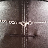 925 STERLING SILVER NECKLACE WITH EKG HEARTBEAT PENDANT SET IN SPARKLING CRYSTALS.