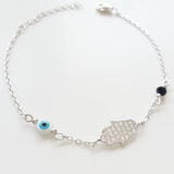 925 STERLING SILVER BRACELET WITH HAMSA HAND PAVED WITH CZ CRYSTALS AND TURKISH EVIL EYE CHARM.