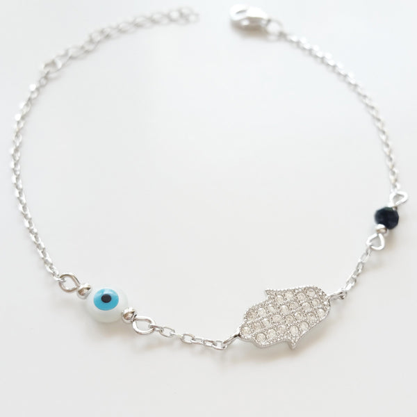 925 STERLING SILVER BRACELET WITH HAMSA HAND PAVED WITH CZ CRYSTALS AND TURKISH EVIL EYE CHARM.
