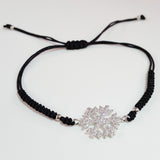 925 STERLING SILVER CZ CRYSTAL SNOWFLAKE ON THREADED BRAIDED BRACELET.