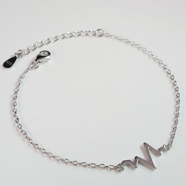 925 STERLING SILVER BRACELET WITH EKG HEARTBEAT CHARM.