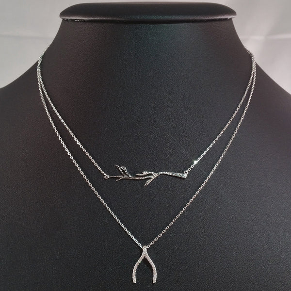 925 STERLING SILVER DOUBLE LAYER NECKLACE WITH CRYSTAL WISHBONE AND TREE BRANCH PENDANT.