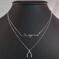 925 STERLING SILVER DOUBLE LAYER NECKLACE WITH CRYSTAL WISHBONE AND TREE BRANCH PENDANT.