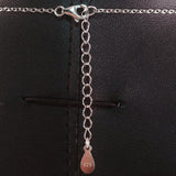 925 STERLING SILVER NECKLACE WITH TURKISH EVIL EYE CHARM AND HAMSA HAND PENDANT SET IN SPARKLING CRYSTALS.