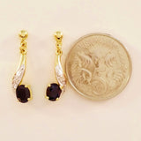 9K SOLID GOLD 1.15CT NATURAL BLACK SAPPHIRE AND DIAMOND DROP EARRINGS.