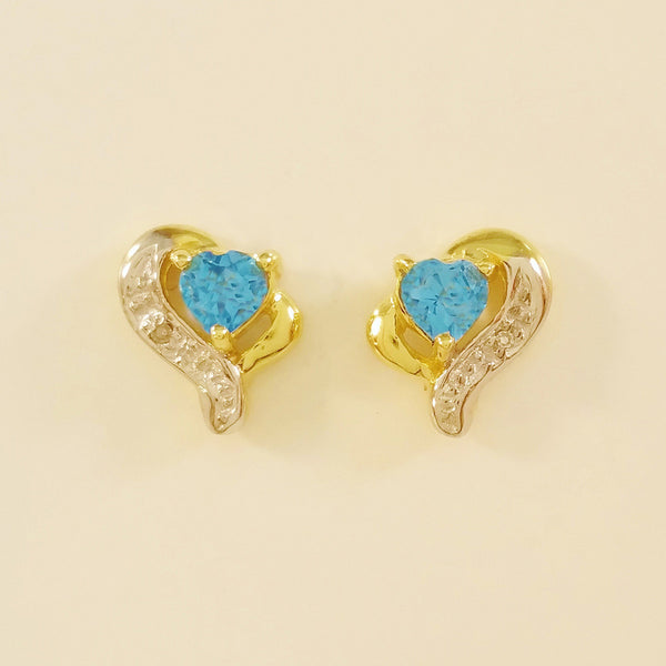 9K SOLID GOLD 0.45CT SWISS BLUE TOPAZ AND DIAMOND STUD EARRINGS.